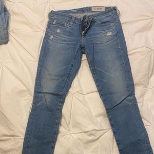 AG denim, worn a handful of times. Low rise, stretch and distressed.